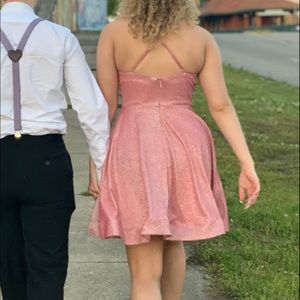 Sparkly, pinky, short, formal dress.